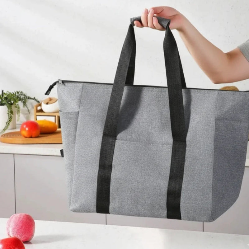 Grand sac isotherme gris porter par un homme
