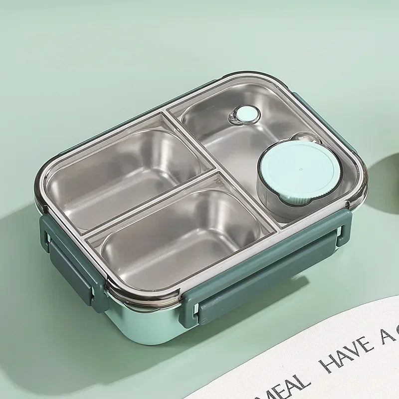 Lunch box isotherme en inox couleur menthe avec trois compartiments et un petit pot hermétique, idéale pour séparer les plats et sauces. Parfaite pour emporter un repas équilibré au bureau, à l’école ou en pique-nique.