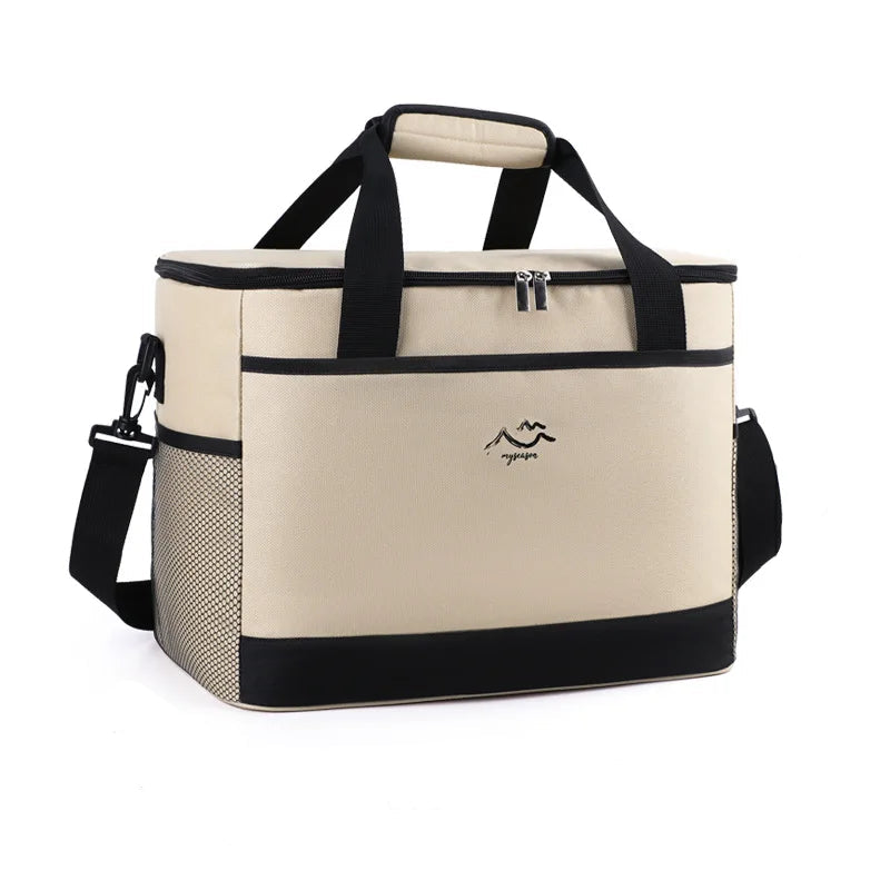 sac isotherme beige crème avec base noire, bandoulière et poignées renforcées, présenté sur fond blanc en vue studio