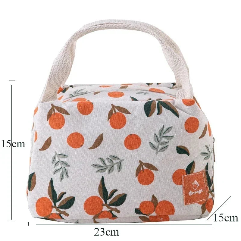 Sac isotherme en toile à motifs d’oranges avec poignées en coton, dimensions 23×15×15 cm, idéal pour le déjeuner ou le pique-nique.