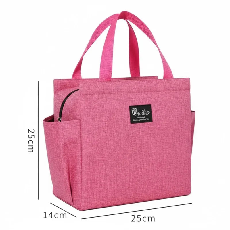 Sac isotherme rose avec poignées, affichant ses dimensions 25 cm par 25 cm et 14 cm de profondeur