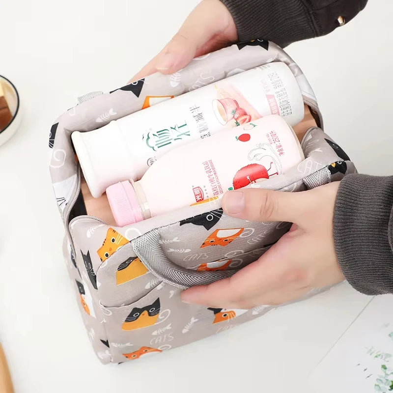 Petit sac isotherme gris avec des dessins de chat