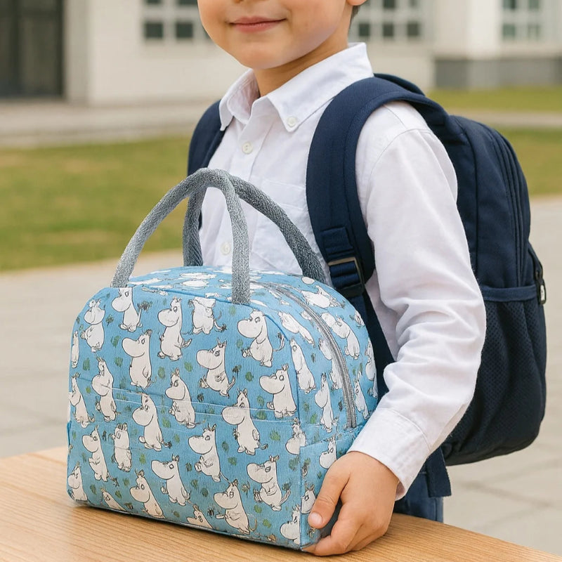 Petit sac isotherme avec motif hippopotame bleu avec un enfant