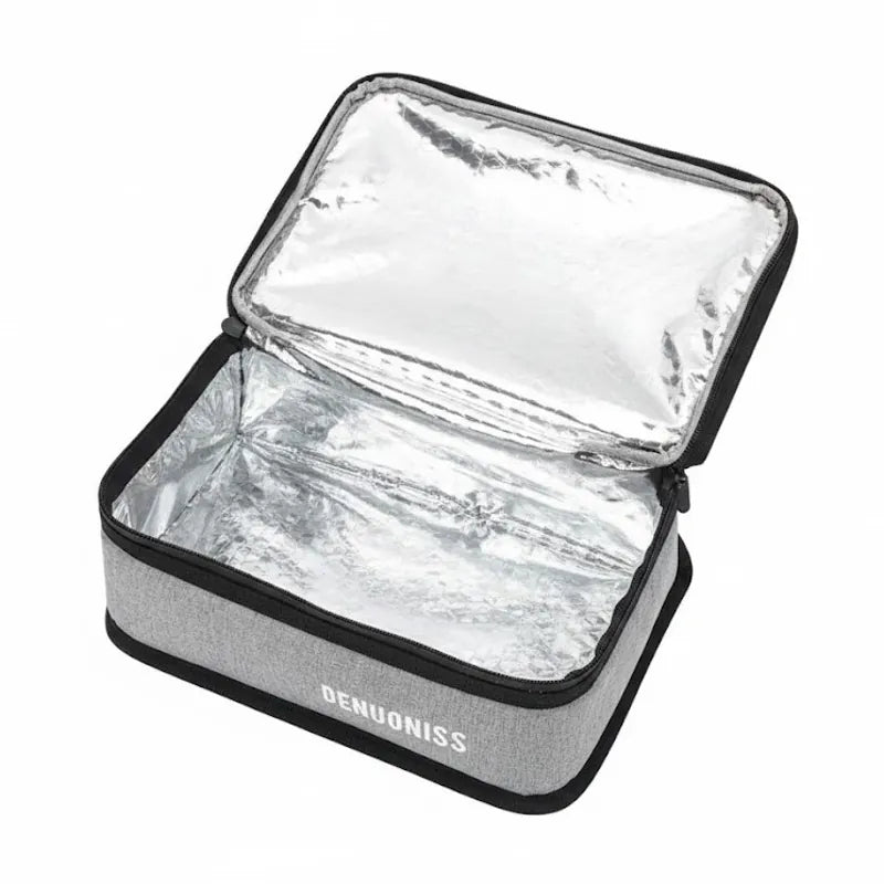 Sac isotherme gris ouvert avec doublure aluminium, montrant l’intérieur destiné à conserver la température des repas.