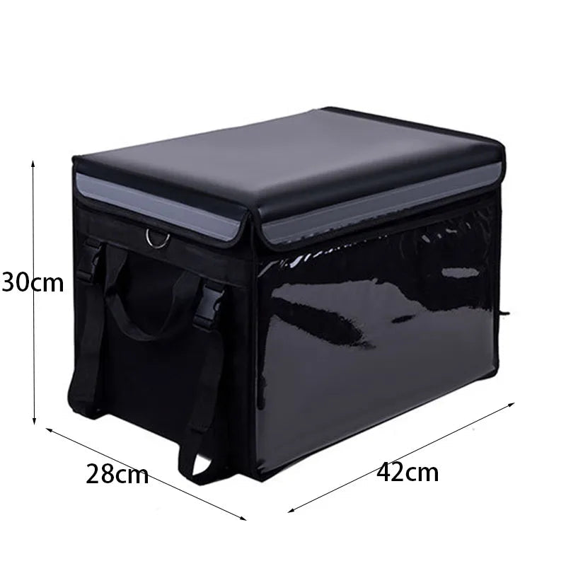 Sac isotherme de livraison noir rectangulaire, avec parois transparentes, poignées et bandoulière. Dimensions indiquées : 42 cm de long, 28 cm de large et 30 cm de haut.