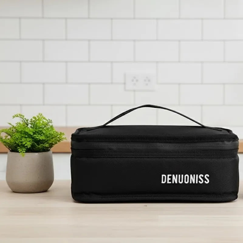 Sac isotherme noir posé sur un plan de cuisine, idéal pour transporter des repas au quotidien.