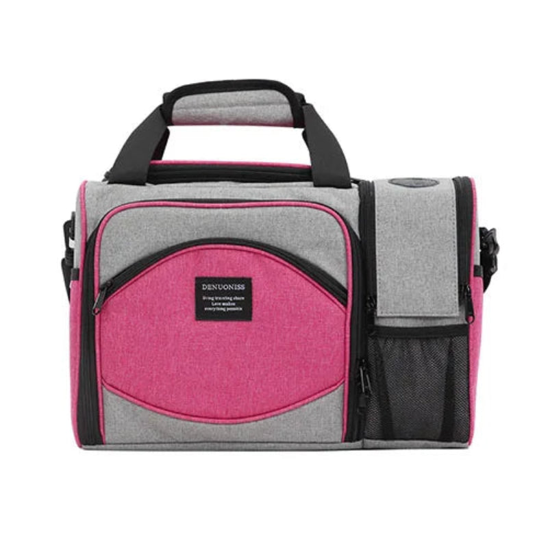 Sac isotherme pique-nique rose et gris vu de face, avec poche frontale zippée et poignée renforcée pour transporter un repas.