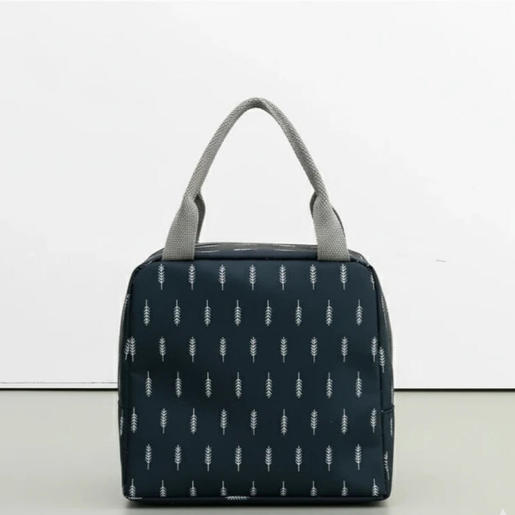 Sac isotherme repas bleu marine vu de dos, décoré de motifs blancs en forme de plume.