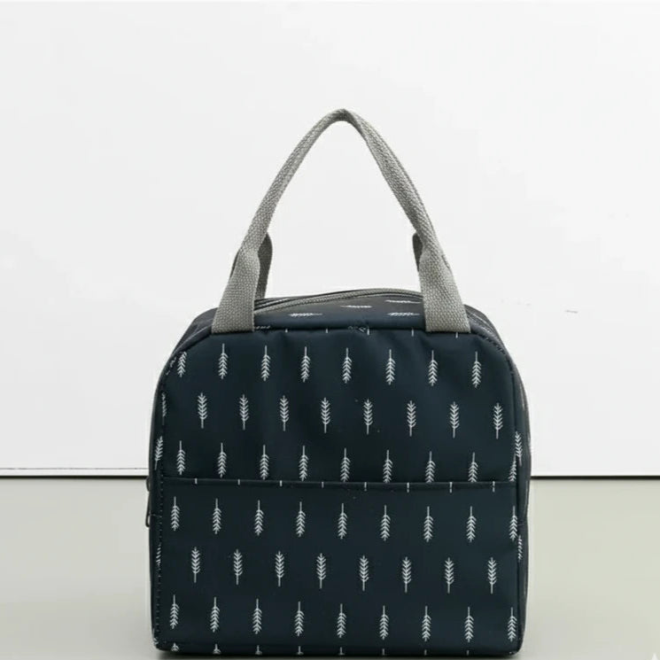 Sac isotherme repas bleu marine vu de face, décoré de motifs blancs en forme de plume.