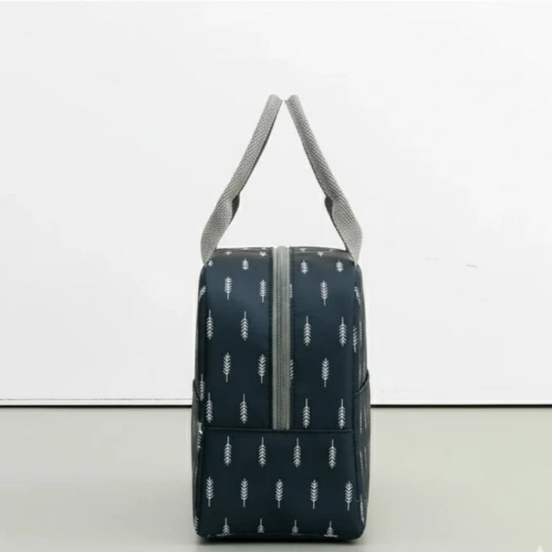 Sac isotherme repas bleu marine vu de côté, avec motifs blancs en forme de plume.