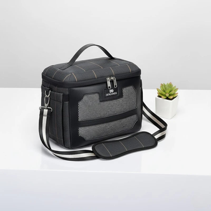 Sac lunch isotherme gris 8L présenté en vue diagonale, avec poignée renforcée et bandoulière réglable, idéal pour transporter un repas au travail.