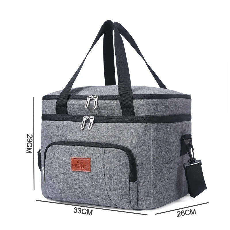 Sac repas isotherme gris à double compartiment avec dimensions 33 × 26 × 29 cm, idéal pour transporter repas et boissons.